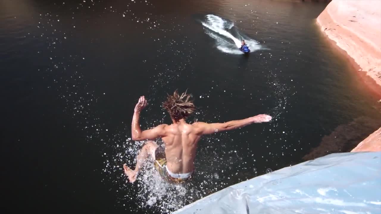 Пързаляне от висока скала .. Cliff Slip and Slide!